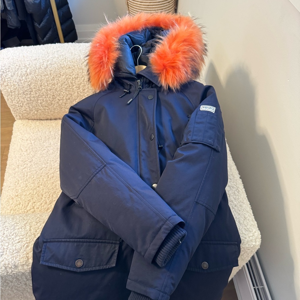 Kenzo winter coat with orange fur. The original price is $895.